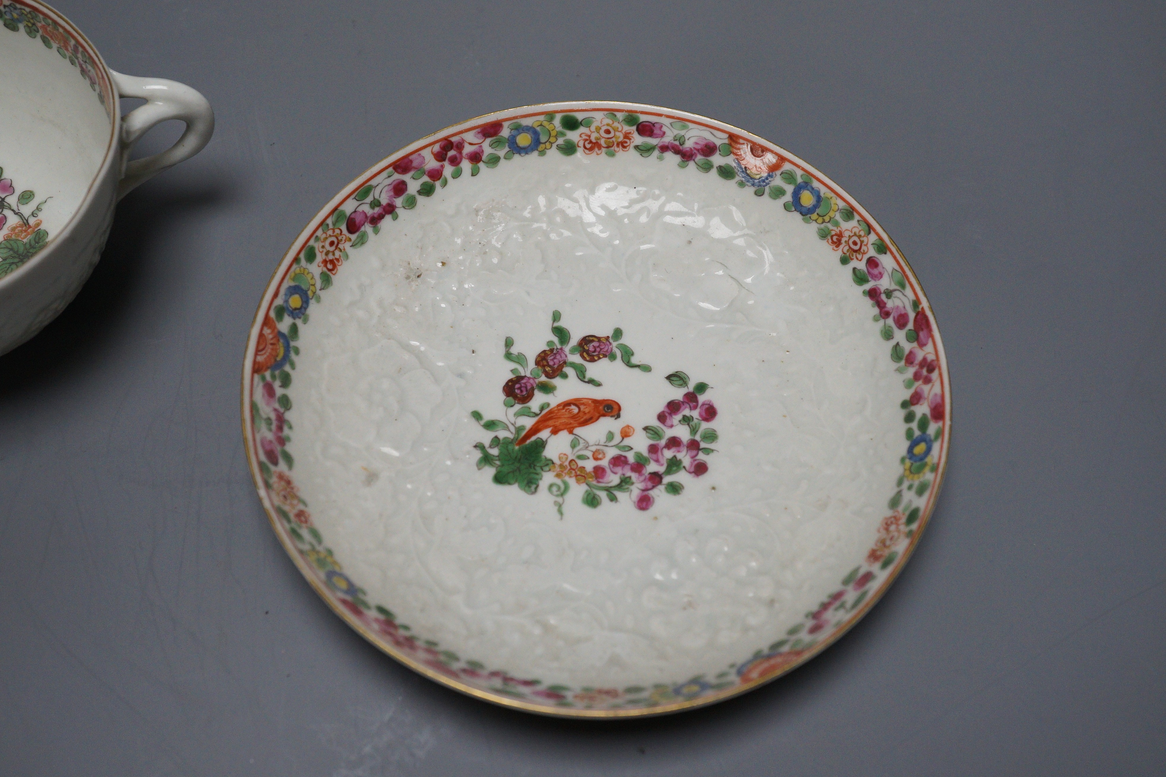 A small bone china pot pourri, possibly Spode, a relief moulded teacup and saucer, and three cups